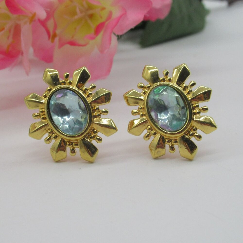 Avon Starburst Simulated Aquamarine Glass Rhinestone Gold Tone Clip On Earrings